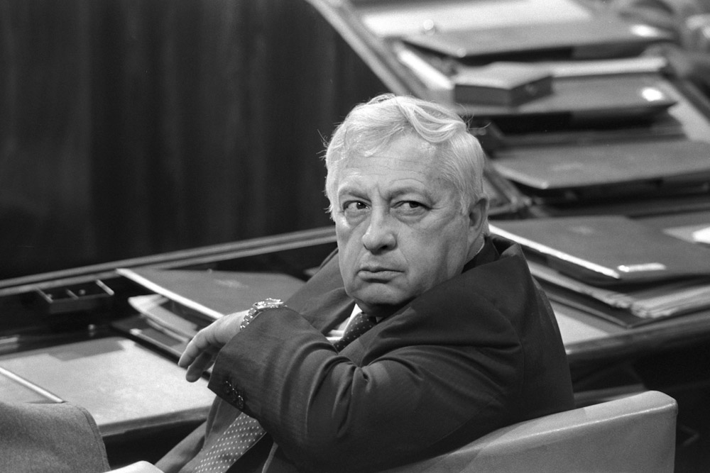 Israel's Minister of Industry and Trade Ariel Sharon sits in a session of Israel's parliament in Jerusalem May 6, 1985 in this file photo released by the Government Press Office. Ariel Sharon passed away on January 11, 2014 at the age of 85. REUTERS/Nati Harnik/Government Press Office/Handout/Files (JERUSALEM - Tags: OBITUARY POLITICS) ATTENTION EDITORS - FOR EDITORIAL USE ONLY. NOT FOR SALE FOR MARKETING OR ADVERTISING CAMPAIGNS. THIS IMAGE HAS BEEN SUPPLIED BY A THIRD PARTY. IT IS DISTRIBUTED, EXACTLY AS RECEIVED BY REUTERS, AS A SERVICE TO CLIENTS. ISRAEL OUT. NO COMMERCIAL OR EDITORIAL SALES IN ISRAEL